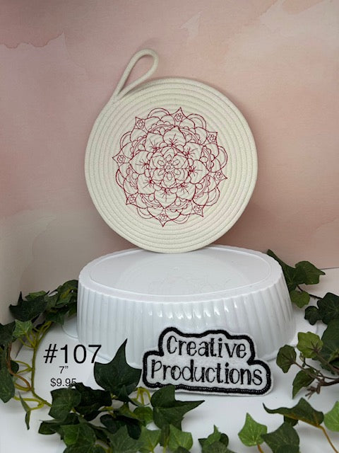 Rope trivet with embroidered design