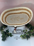rope basket with embroidered wheat design