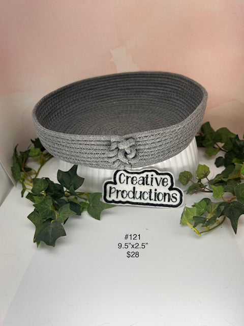 Gray rope basket with decorative knot