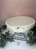 Natural colored rope basket with  green embroidered design accent