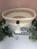 Natural colored rope basket with brown print fabric insert and trim