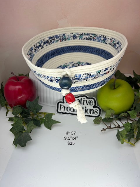 Rope basket with blue floral insert and trim