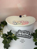 Peeper Keeper rope basket with embroidered eyeglass design in multicolors