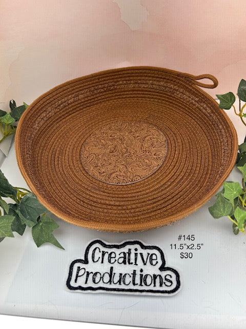 Rust brown colored rope basket with print fabric insert and trim