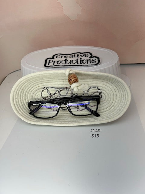 Peeper Keeper with embroidered eye glasses design.