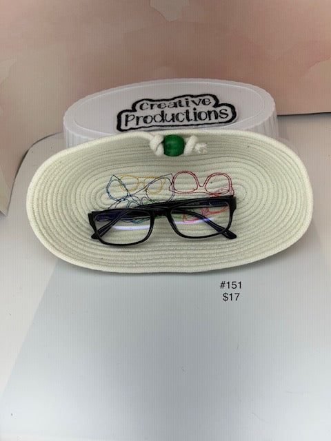 Peeper Keeper rope basket with multicolored embroidery of eyeglasses.