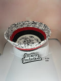 Rope basket with black and white floral design fabric insert and red and black accents