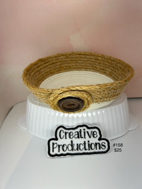 Natural colored rope basket with jute rope accents and wooden button trim