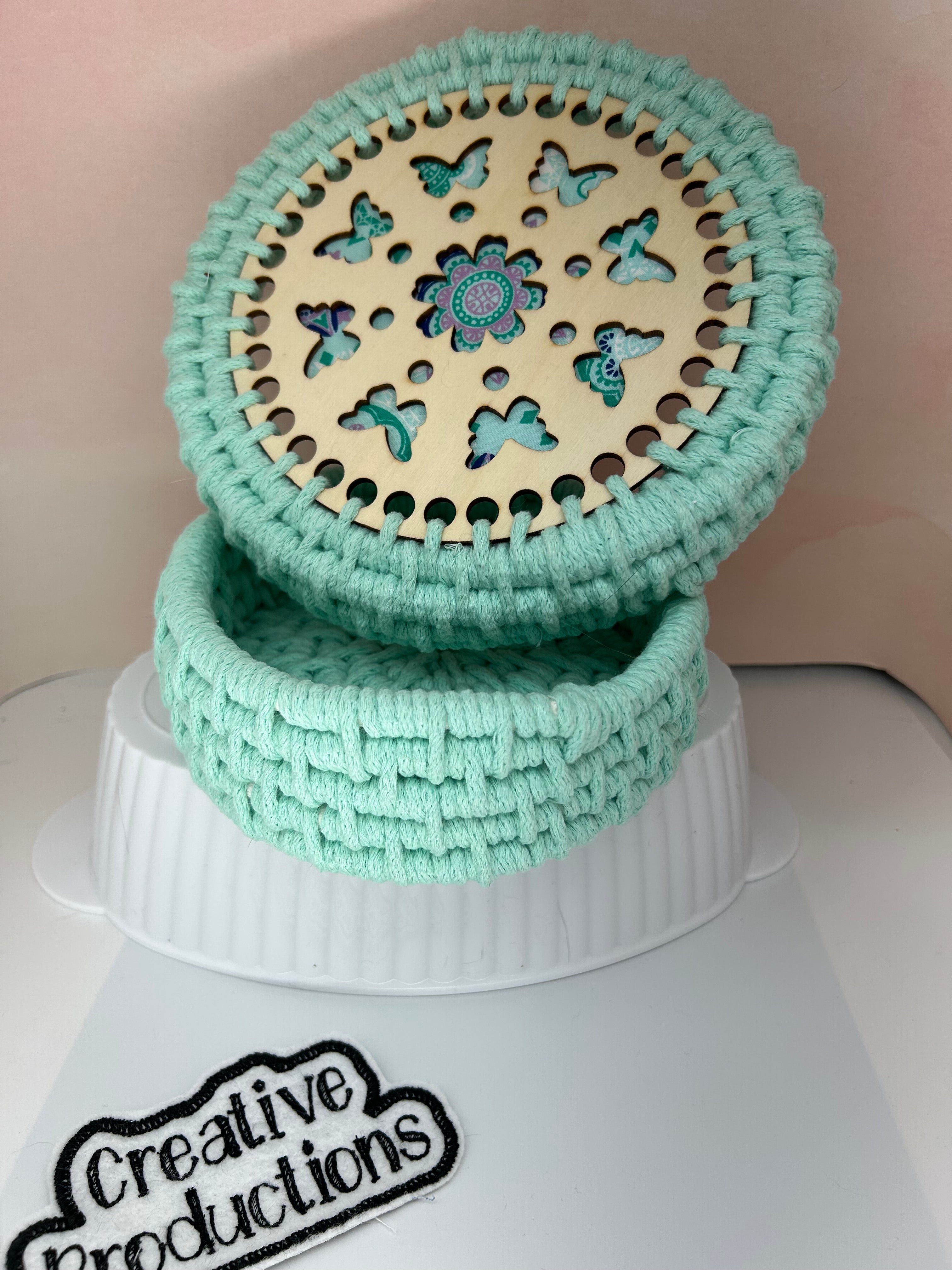 Aqua colored coil wrapped rope trinket box with lid.